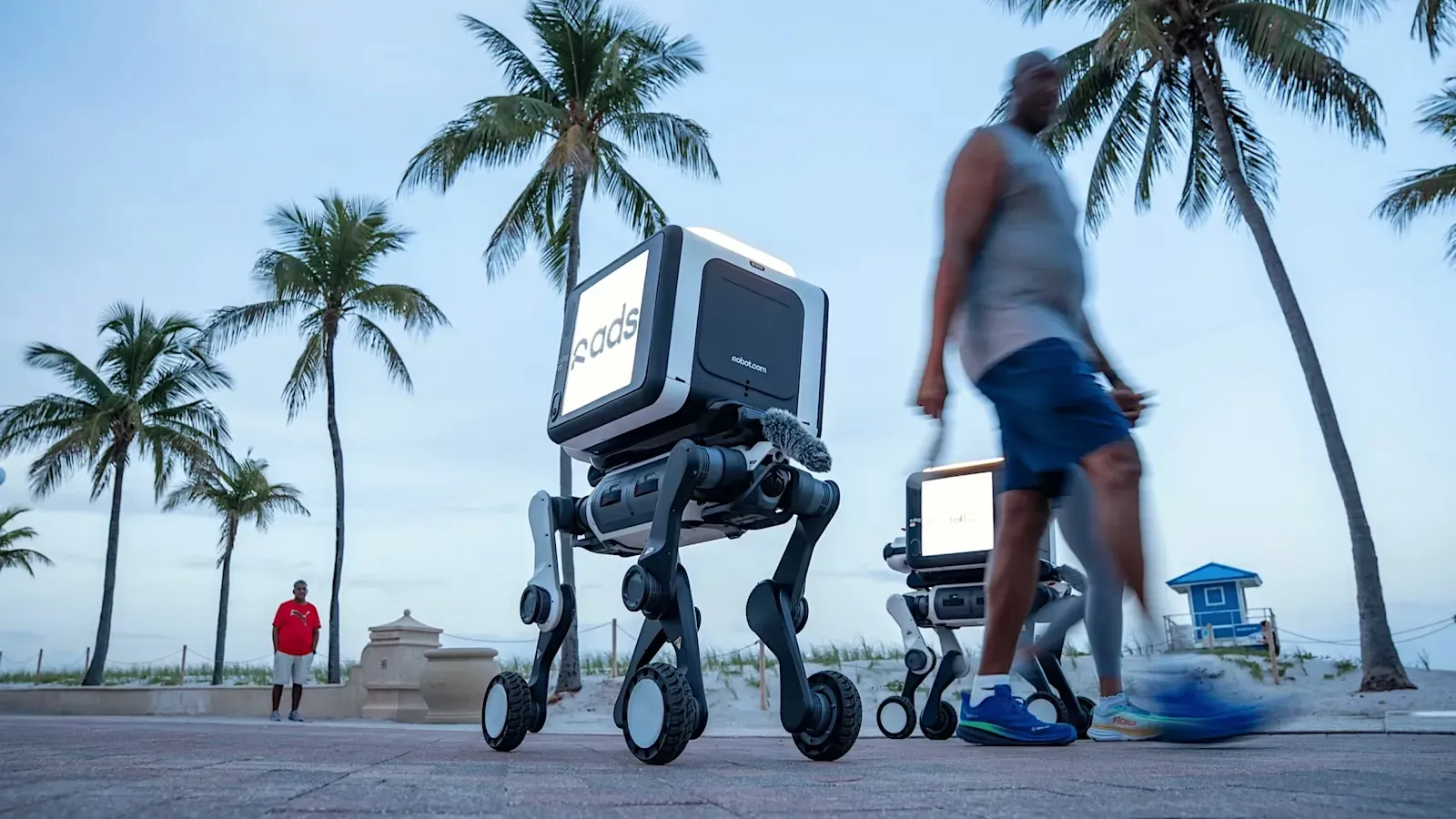 Wheel-legged robot dog dumps packages – and ads