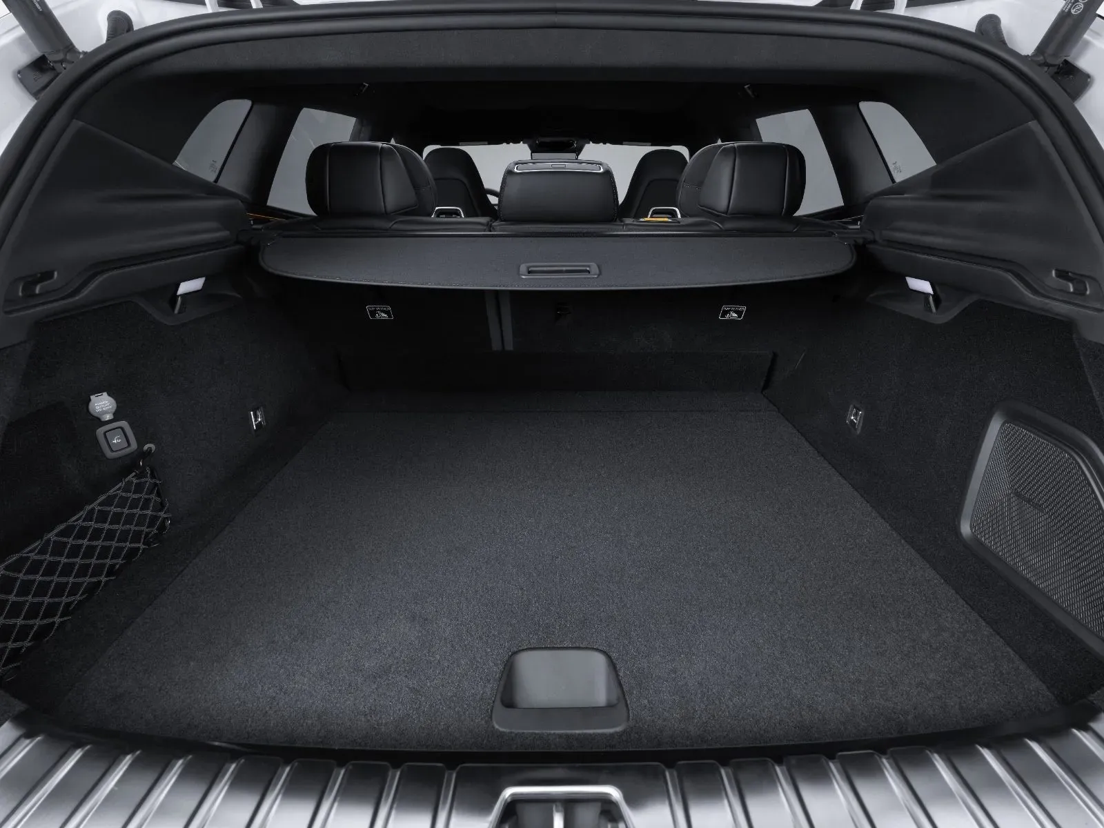 Polestar 4 SUV rear cargo compartment with the rear seats folded